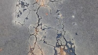Pekerjaan Pengaspalan Hotmix di DISDUKCAPIL Kabupaten Bogor TA 2025, Diduga Asal Asalan